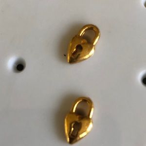 Heart shaped gold tone tone pierced earrings